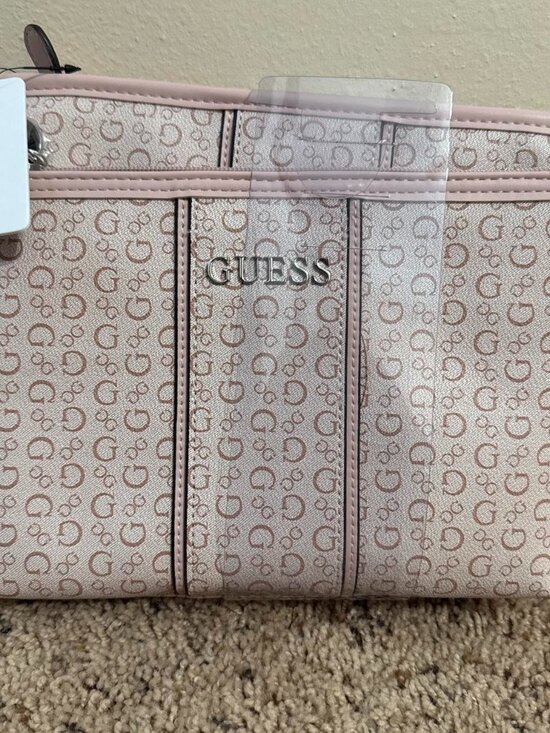 Guess Handbags - Set of two Guess pink cosmetic bags with the tags still attached